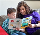 Zach reading with female therapist